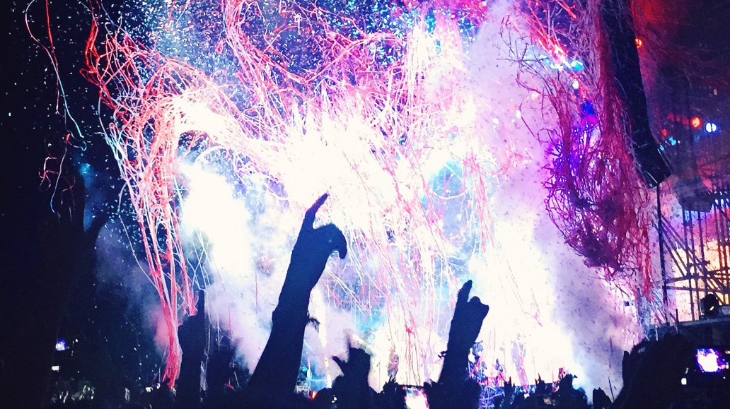 fingers raised flourescent lights