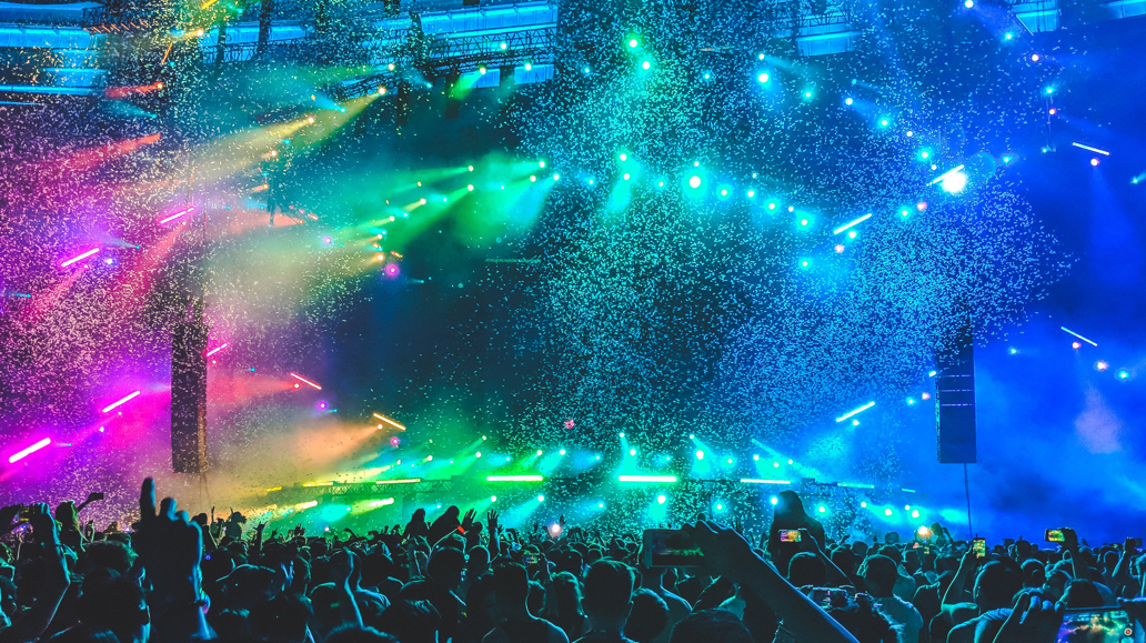 neon pink, orange, green, blue smoke on stage